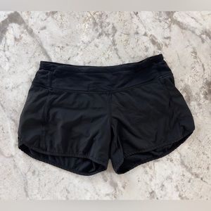 LuLuLemon “Speed Up Mid Rise Lined Short 4” - size 4 in color Black.